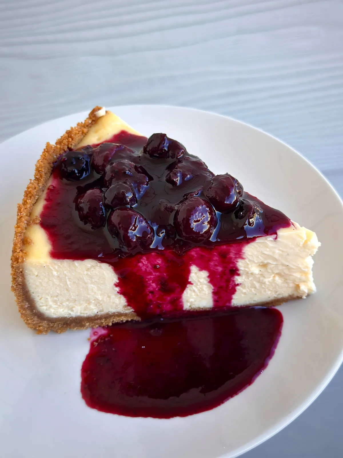 Vanilla Bean Cheesecake with Blueberry Compote
